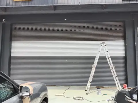 Shop roller shutters repainted and refurbished